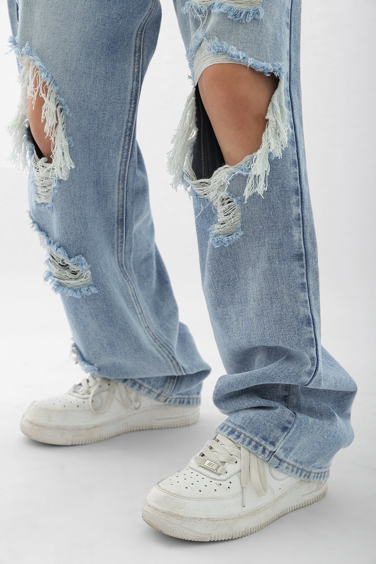 Light Blue Thin Ripped Jeans For Women